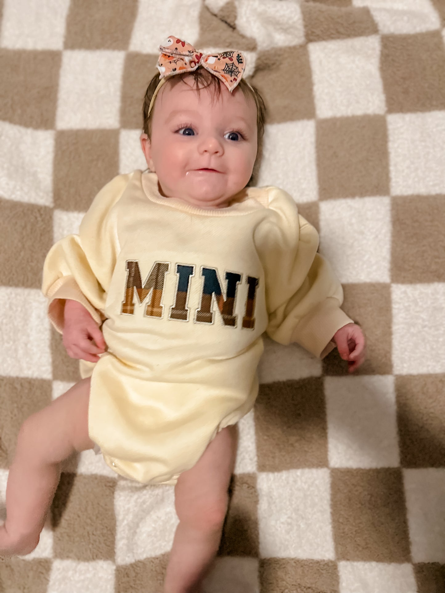 Mini embroidered sweater romper