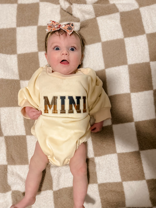 Mini embroidered sweater romper