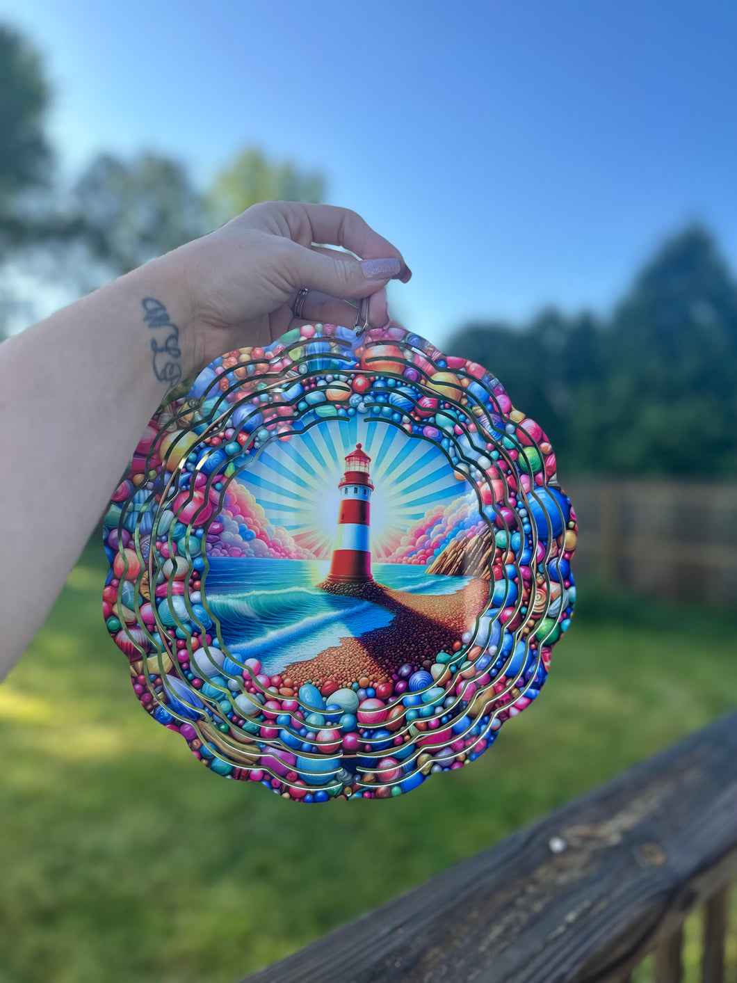 Lighthouse wind spinner