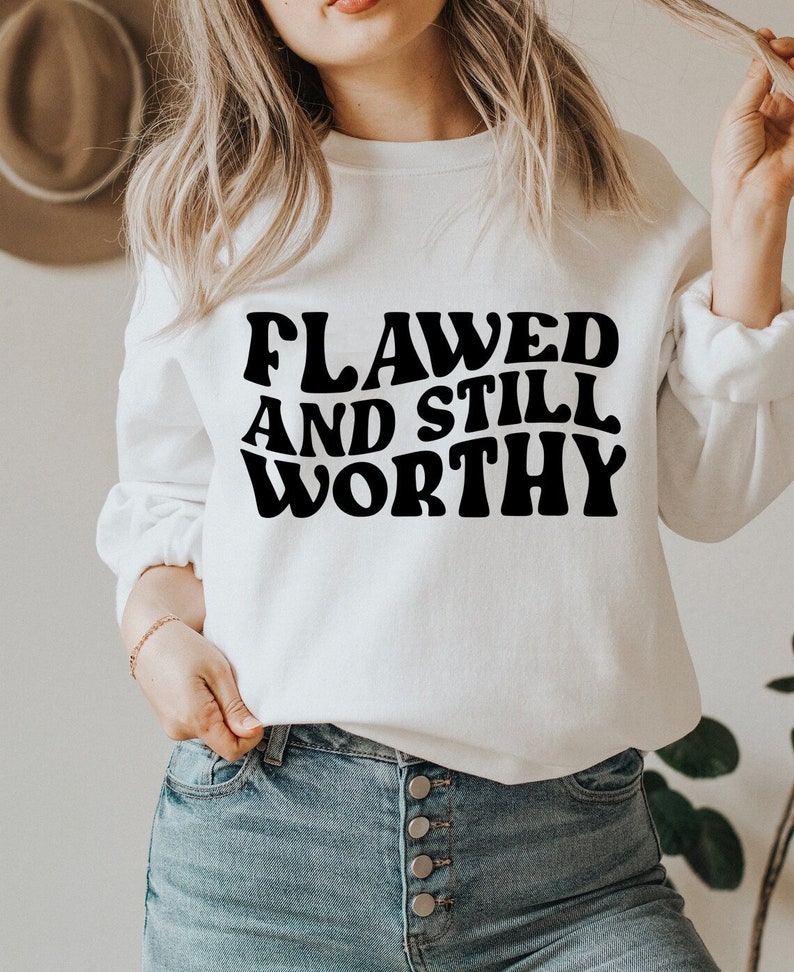 flawed, still worthy sweatshirt